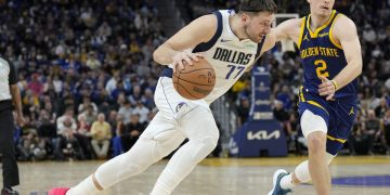 Doncic asombra en un duelo histórico de triples frente a los Warriors